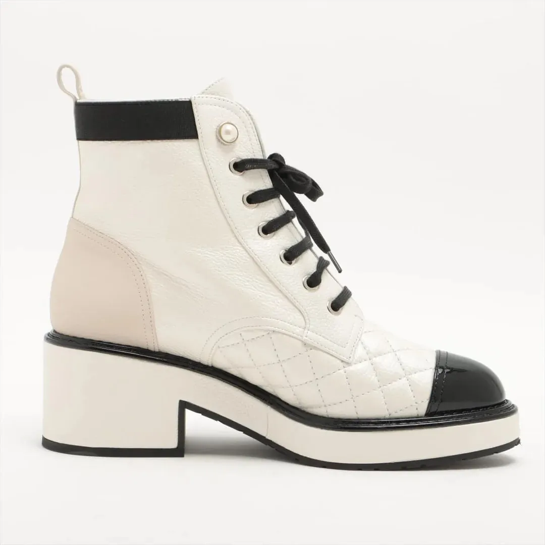 CHANEL PEARLY CALFSKIN QUILTED LACE-UP BOOTS
